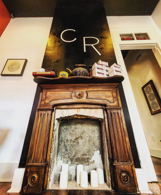 CR Coffee Magazine Street fireplace room interior