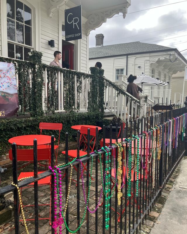 Mardi Gras beads on the Magazine Street fence