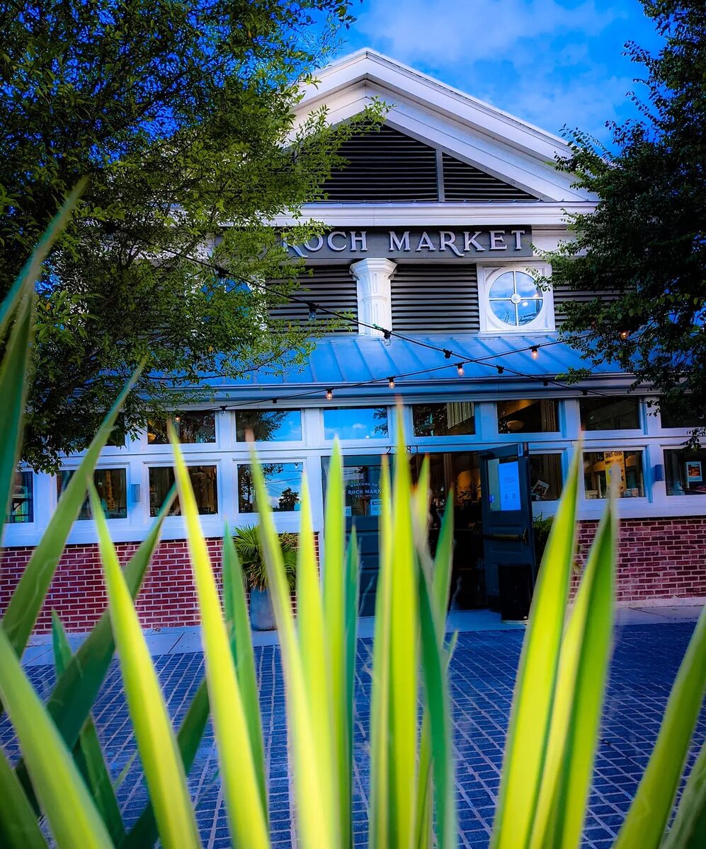 St. Roch Market exterior through tropical plants